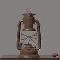 Vintage Brown Kerosene Lamp Placed On Wooden Tabletop With Two Small Red Fruits