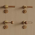Brass Door Handles And Locksets On Wooden Panel With Various Designs
