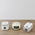 Three Modern Kitchen Appliances With Digital Display And Different Designs On Wooden Floor
