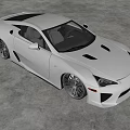 Stunning White Sports Car With Aerodynamic Body And Large Black Alloy Wheels
