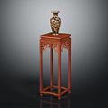 Carved Mahogany Flower Stand With Golden Patterned Vase On Top