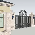 Elegant Wrought Iron Entrance Gate With Arched Top And Radiant Decorative Design Stone Pillars