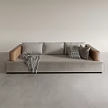 Light Gray Sectional Sofa With Brown Armrests Decorative Pillows And Plaid Throw Blanket 3d model