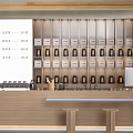 Wooden Bar Counter Featuring Neatly Arranged Tea Canisters High Stools And Wall Menu Board