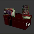 Adidas Red High Top Shoes with Red Laces on Red Shoe Box with Black Stripes