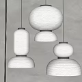 Modern Paper Pendant Lights With Various Shapes White Shades Dark Bases Hanging On Gray Wall