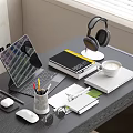 Elegant Modern Laptop Setup On Desk With Headphones Books And Coffee Mug