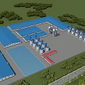 Industrial Factory with Blue Roof Cylindrical Tanks and Surrounding Trees