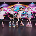 Kids Roller Skating Indoors With Colorful Wall Wearing Pink Helmets And Protective Gear