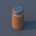 Brown Glass Jar With Silver Lid Containing Granular Food For Kitchen Storage