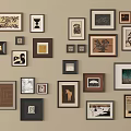 Gallery Wall With Framed Artworks In Different Sizes And Various Styles