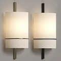 Modern Wall Lamps With Cylindrical White Fabric Shades And Metal Accents Mounted On Wall