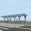 Well Lit Road Facilities With Bus Shelter Benches Street Lights And Trees At Night