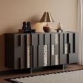 Modern Entryway Console Cabinet with Geometric Panels Table Lamp Sculptures Books and Vase