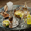 Refreshing Beverages with Bottles Glasses Lemon Slices Ice Cubes and Trays on Marble Table