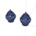 Pair of Blue and White Ceramic Jars with Intricate Floral Patterns and Lids