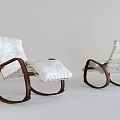 Two Modern Lounge Chairs With White Padded Seats And Wooden Curved Rocking Frames