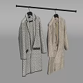 Two Coats Hanging on Hanger Black White Checkered Long and Beige Mid Length Grey Background