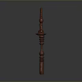 Red Carved Decorative Key With Intricate Floral Pattern And Ornate Handle