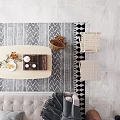 Warm Neutral Toned Living Room With Geometric Pattern Rug And Light Wooden Coffee Table Decor
