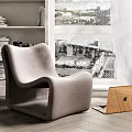 Modern Fabric Accent Chair With Wooden Laptop Near Bookshelf And Window In Cozy Indoor Setting