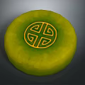 Green Circular Decorative Piece With Intricate Yellow Geometric Pattern In Center