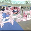 Pink Themed Tea Break Area With Cherry Blossom Backdrop White Bench Cart And Blue Carpet