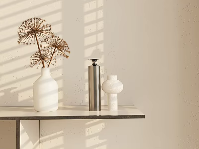 White Vase with Dried Dandelion like Flowers and Decorative Bottles in Sunlight Shadows on Table 3d model