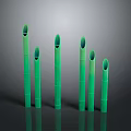 Green Bamboo Plants With Tubular Stems In Various Heights Against Dark Background With Reflections