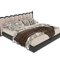 Modern Double Bed Design With Scalloped Black Beige Headboard Patterned Pillows And Brown Throw