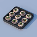 Eight Stuffed Mushrooms on Black Tray Topped with Fresh Green Herbs