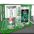 Commercial Retail Showcase With Green Neon Lighting For Heineken Beer Bottles And Promotional Posters