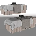Two Comfortable Massage Beds with White Sheets Gray Towels and Beige Skirts