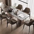 Modern Dining Table Set With Six Gray Chairs Decorative Fruit Bowl Potted Plant And Open Book