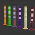 Colorful Bollards With White Stripes And Round Base On Dark Background