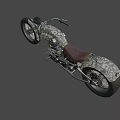 Camouflage Designed Motorcycle With Brown Seat Large Tires Chrome Exhaust Pipes And Round Headlight