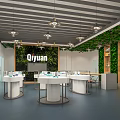Modern Qiyuan Store Interior With Green Plant Walls White Round Display Tables And Hanging Lamps
