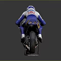 Racing Motorcycle With Blue Yellow Orange Livery Rider In Suit And Helmet Displaying Sponsor Logos