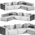 Modern Modular Sectional Sofa With Pillows And Throw Blankets In Neutral Tones For Living Room