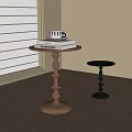 Modern Side Tables With Cylindrical Bases And Round Tops Featuring Books And Mug Near Window