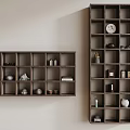 Dark Wooden Display Shelves With Multiple Compartments Holding Books Clock And Decorative Items