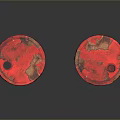 Two Old Red Rusted Worn Metal Industrial Drums With Damaged Surfaces