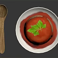 Delicious Pudding Dessert in White Bowl with Red Drizzling Sauce Green Parsley and Wooden Spoon
