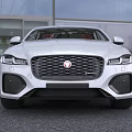 White Jaguar Sedan Modern Sporty Design With Red Interior Alloy Wheels And Front Grille
