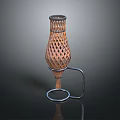 Green Plant In Modern Brown Hollow Out Vase With Metal Stand On Dark Background