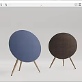 Round Desktop Speakers With Blue And Brown Fabric Covers Wooden Legs Modern Design