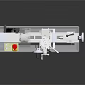 Industrial Lathe Machine With Yellow Control Panel And Rotating Metal Components