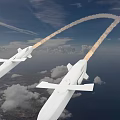 Two White Military Missiles Flying With Smoke Trails Over Cloudy Sky