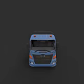 Blue Commercial Truck Front View With Cab Headlights And Grille Design