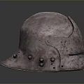 Ancient Metal Weapon Helmet With Riveted Details And Rustic Historical Design